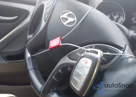 2015 Hyundai Elantra Limited z USA, uszkodzony, nr VIN 5NPDH4AE2FH581248